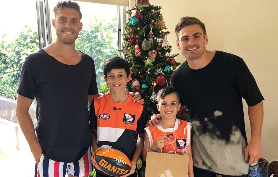 SLIDER-ConigliosBirthdayGift.jpg Stephen Coniglio recruited new teammate Tommy Sheridan to accompany him on some of his visits to young GIANTS members' to celebrate his 25th birthday. - AFL,GWS Giants,Stephen Coniglio